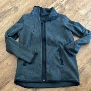 Lululemon woman’s jacket. Size 6. It is grey with black detail.